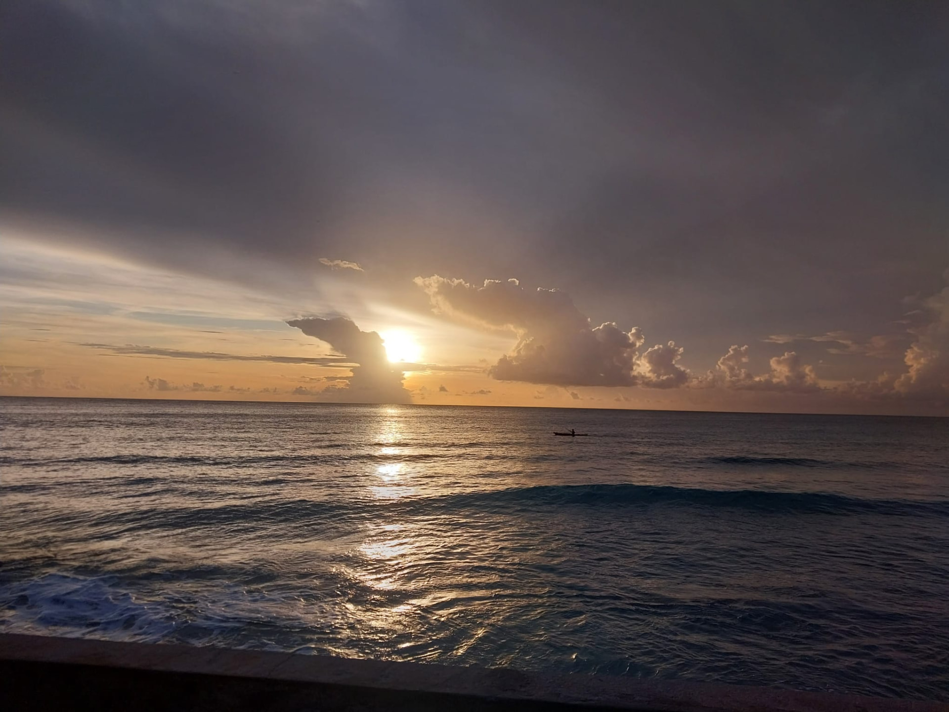 Golden sunset over a west coast Barbados beach visited on an On The House Taxi Service sunset tour