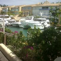 Luxury yachts in the marina at Port St. Charles on the west coast of Barbados, seen on an island tour