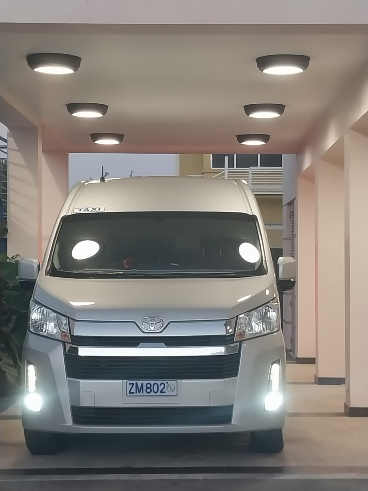 Private jet passengers boarding the On The House Taxi Service luxury van at the PAS Jet Centre in Barbados